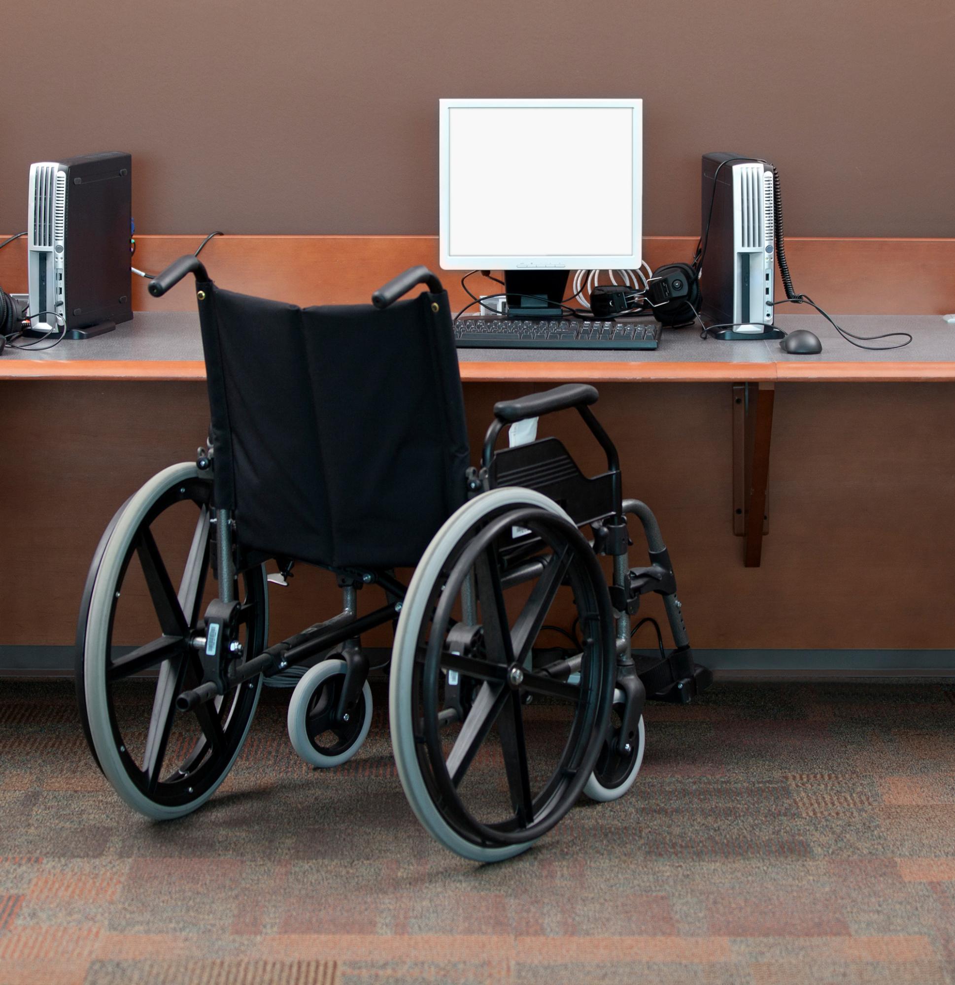 Wheelchair at a computer workstation